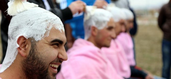 Lösemili çocuklar için saçlarını kazıttılar