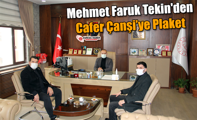 Mehmet Faruk Tekin'den Cafer Canşi’ye Plaket