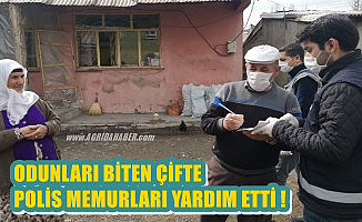 Ağrı'da Polis Memurları yakacağı biten yaşlı çifte odun götürdü