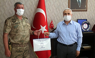 Jandarma Komutanı Özkul'dan Müftü Topçu'ya veda ziyareti